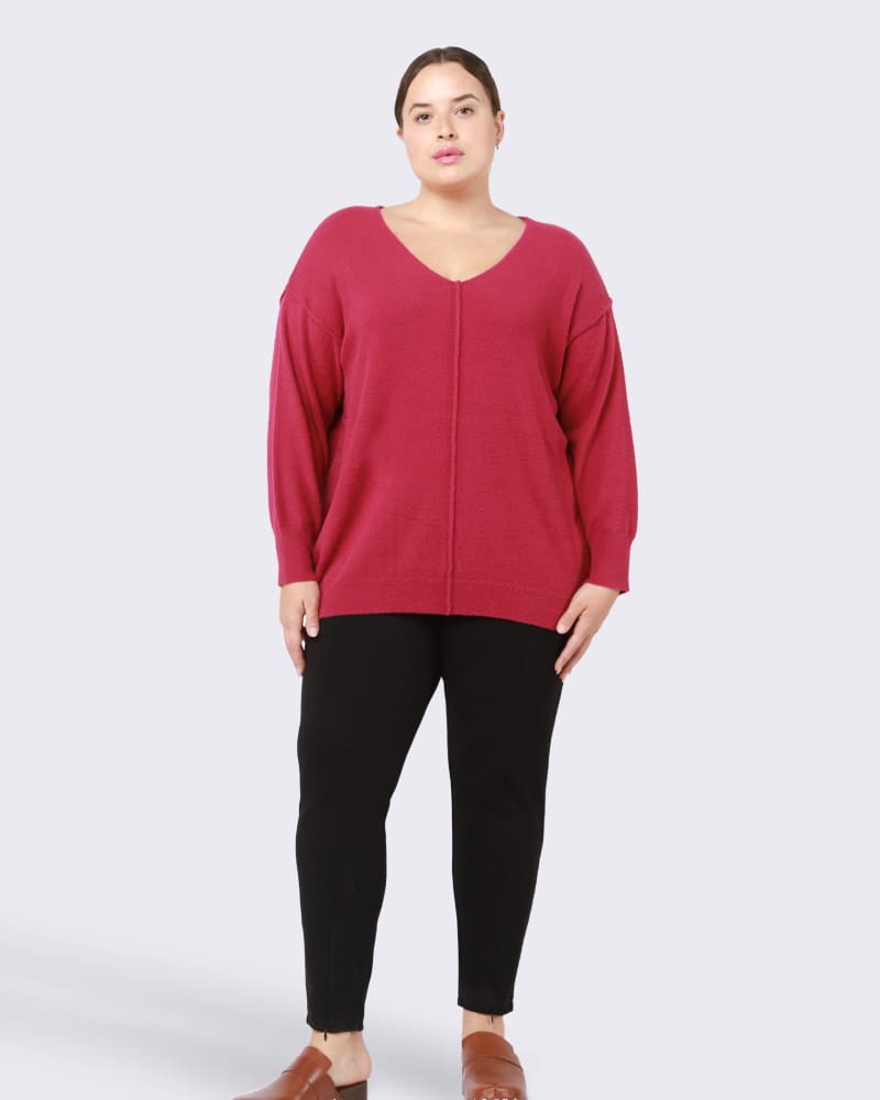 Front of a model wearing a size 0X Fiona V-Neck Sweater in Magenta by DEX PLUS. | dia_product_style_image_id:246235